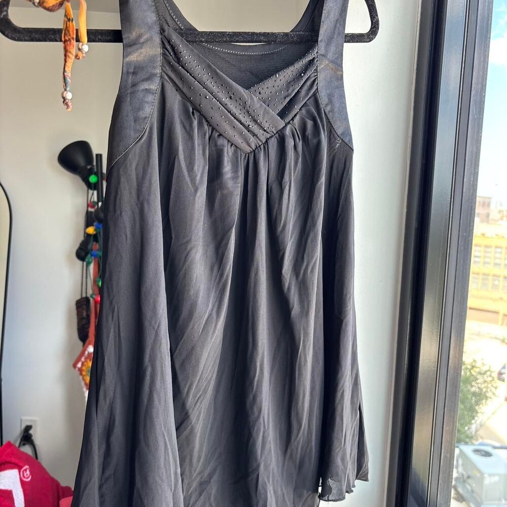 Women's black flowy top with rhinestones